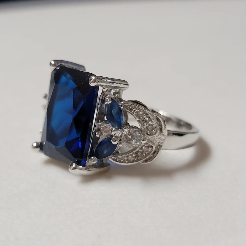Simulated Sapphire Silver Tone Cocktail Ring Angel Wings and Marquise Stones